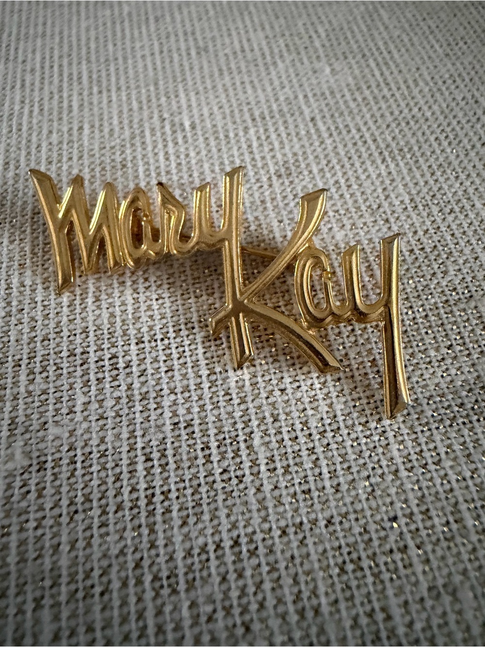 Mary Kay Gold Script Logo Pin